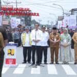 Bupati Asahan Dampingi Presiden Jokowi Resmikan Jalan Inpres