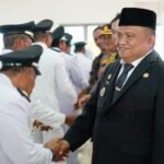 Pj Bupati Luwu Kukuhkan dan Serahkan SK Perpanjangan Masa Jabatan 168 Kades dan 1.197 Anggota BPD