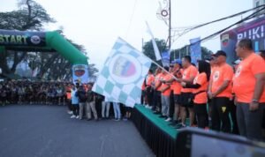 Bupati dan Wakil Bupati Asahan Ikuti Bukit Barisan Fun Run 5K di Lapangan Merdeka Medan
